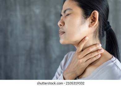 Asian Woman Having Sore Throat