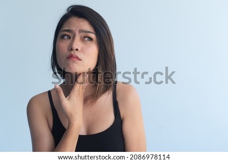 asian woman having sore throat or pharynx allergy