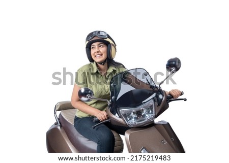 Asian woman with a helmet sitting on a scooter isolated over white background