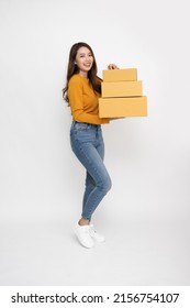 Asian Woman Holding Package Parcel Box Isolated On White Background, Delivery Courier And Shipping Service Concept, Full Body Composition