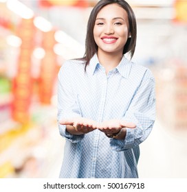 Asian Woman Holding Something