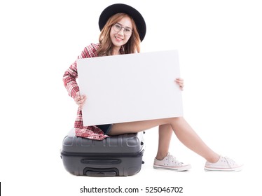 Asian woman holding a white board with a suitcase on white background.