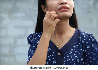 Asian Woman Itchy Face, Scratching Her Hands         