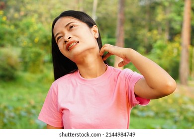 Asian Woman Itchy Neck Area