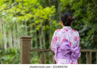 Asian Woman With Japanese Yukata In Countryside