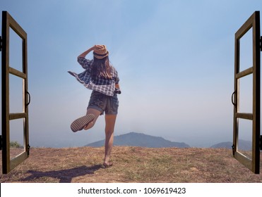 Asian Woman Jump Out From Open Door To Mountain Top View With Exciting Feeling, Explore Travel Discovery Concept