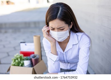 Asian Woman Is Laid Off Due To COVID-19 And Feel Upset With Faicial Mask