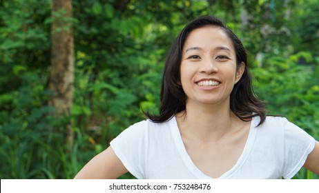 Asian Woman Long Hair Facial Epression Green Nature Background