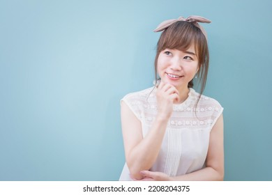 Asian Woman Looking Forward And Excited