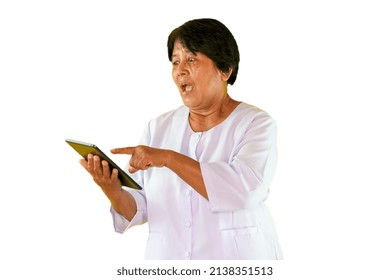 Asian Woman Looking At A Split Screen On A White Background.