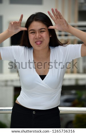 Asian Woman Making Funny Faces