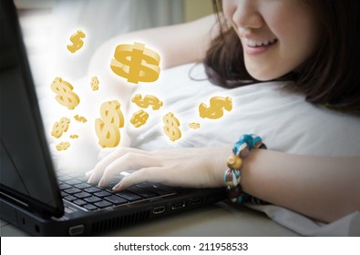 Asian Woman Making Money Online By Using Laptop