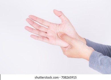 Asian Woman Massaging Painful Hand On A White Background,Carpal Tunnel Syndrome From Work