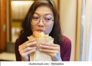 Asian Woman Mature Adult Eating Bread Carbohydrates