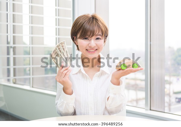 asian woman with money and\
car