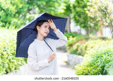 Asian woman with a parasol
