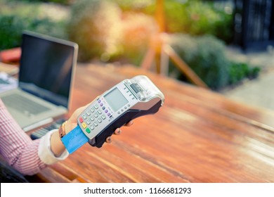 Asian Woman Paying By Credit Card At Gift Shop ,woman Hands Entering Security Pin In Credit Card Reader Swipe Through Terminal For Payment In Booth,buy And Sell Products Service.