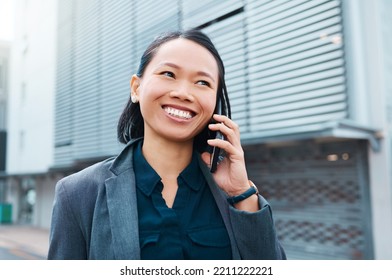 Asian Woman, Phone Call And Talking To Business Contact In With A Smile On City Street While Networking On Smartphone. Happy Corporate Employee Female With 5g Network Connection Walking In Singapore