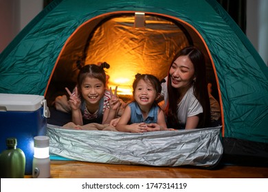 Asian Woman Playing And Staying In Tent With Her Daughter And Having Fun With Camping Tent In Their Bedroom A Staycation Lifestyle A New Normal For Social Distancing In Coronavirus Outbreak Situation