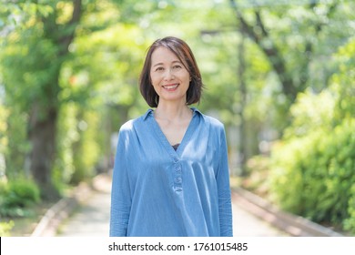 Asian woman portrait of senior in casual clothes