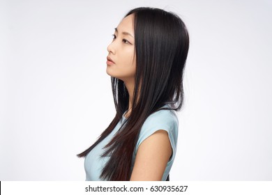 Asian Woman In Profile, Light Background