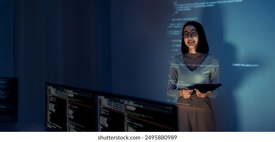 asian woman programmer standing in front of a screen with code projected  presentation the integration of technology and human expertise in software development - Powered by Shutterstock