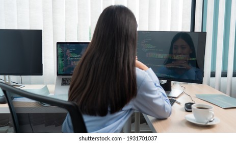 Asian Woman Programmer Typing Source Code With Computer Pc For Developing Program Or Application In Her Office