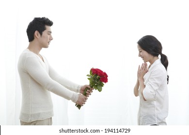 Asian Woman Receiving Flowers