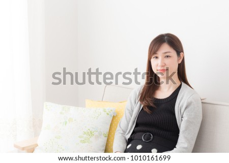 asian woman in the room