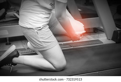 Asian Woman Runner Got Sports Injury On Machine Treadmill At Fitness Gym, Selective Focus