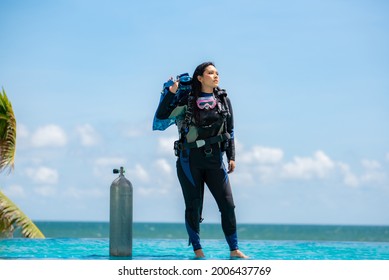 Asian Woman In Scuba Diving Gear.