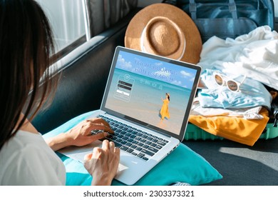 Asian woman search ticket reservation for holiday trip. Girl using travel application for flight tickets and hotel room online booking. Online travel agency, planning for summer and vacation concept. - Powered by Shutterstock