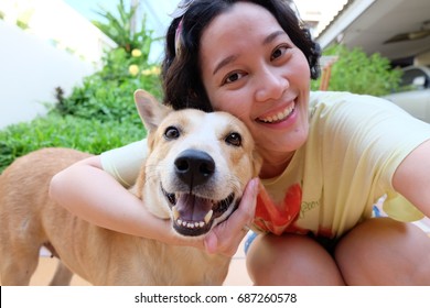 Asian Woman Selfie With Dog