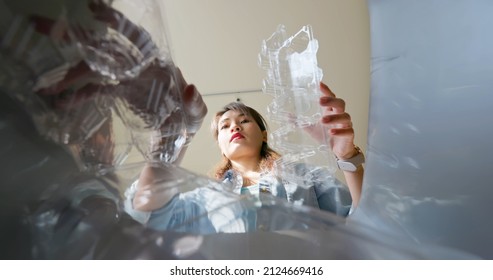 Asian Woman Is Separating Trash And Sort Plastic Waste In Garbage Box For Recycling At Home