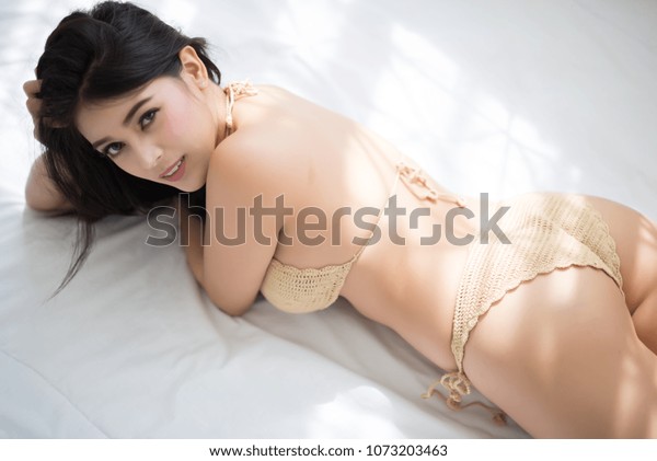 600px x 421px - Asian Woman Sexy Beige Bikini Nude Stock Photo (Edit Now ...