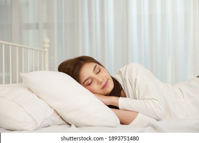 Asian Woman Sleep On Bed At Home.