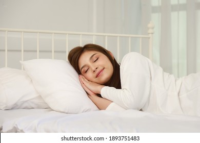 Asian Woman Sleep On Bed At Home.