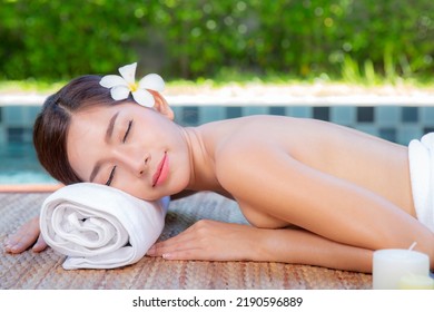 Asian Woman Sleep And Relax In Thai Spa Shop In Hotel And Wait For Take Thai Massage