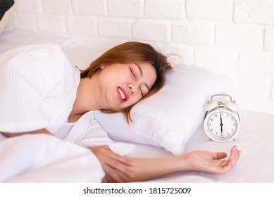 Asian Woman Sleeping On The Bed And Grinding Teeth,Female Bruxism