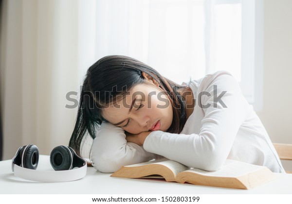 Asian Woman Sleeping On Her Desk Stock Photo Edit Now 1502803199