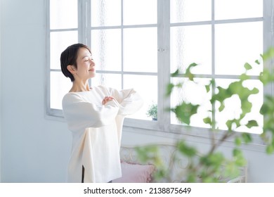 Asian woman with a smile - Shutterstock ID 2138875649