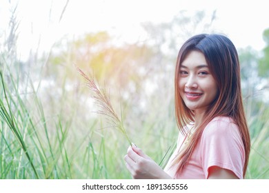 Asian Woman Standing Happy Marmot Smiling On Nature Background