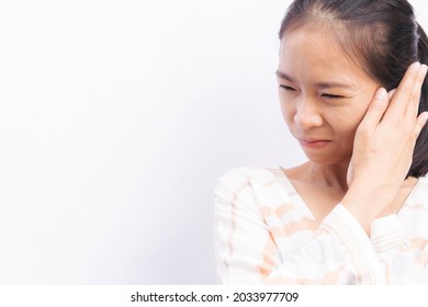 Asian Woman Suffering From Earache. Symptoms Of Acute External Otitis Media. Health Care Concept.