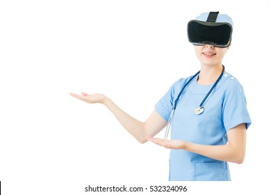 Asian Woman Surgeon Presenting With Virtual Reality. VR Headset Glasses Device. Blackboard Background. School And Education Concept