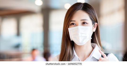 Asian Woman With Surgical Mask Face Protection Walking In Crowds At Restaurant Or Shopping Mall