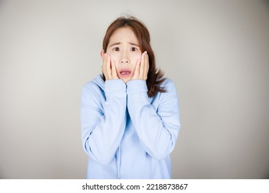 Asian Woman With Surprised Expression