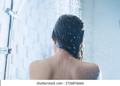 Asian Woman Taking A Shower The Back Of Her Picture