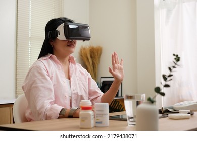 Asian Woman Telemedicine Doctor Online Visit With Virtual Reality Technology Vr Technology At Home.copy Space For Design