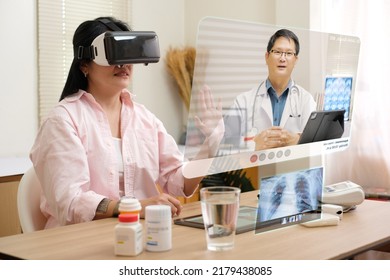 Asian Woman Telemedicine Doctor Online Visit With Virtual Reality Technology Vr Glasses At Home