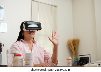 Asian Woman Telemedicine Doctor Online Visit With Virtual Reality Technology Vr Glasses At Home